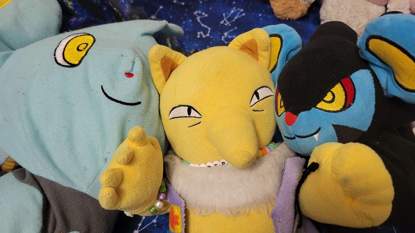 a picture of my luxray plush, shinx plush and hypno plush